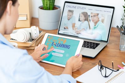 Young woman using digital tablet to sign in online educational site