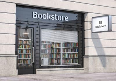 Bookstore shop exterior with books and textbooks in showcase.