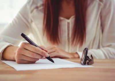 Cropped image of woman drawing in her office